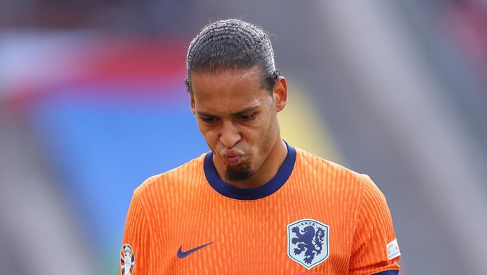 BERLIN, GERMANY - JUNE 25: Virgil van Dijk of the Netherlands reacts during the UEFA EURO 2024 group stage match between Netherlands and Austria at Olympiastadion on June 25, 2024 in Berlin, Germany. (Photo by Alex Livesey/Getty Images)