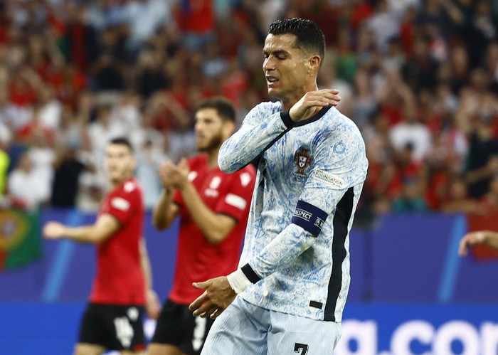 Cristiano Ronaldo Soccer Football - Euro 2024 - Group F - Georgia v Portugal - Arena AufSchalke, Gelsenkirchen, Germany - June 26, 2024 Portugal's Cristiano Ronaldo reacts after missing a chance to score REUTERS/Leon Kuegeler