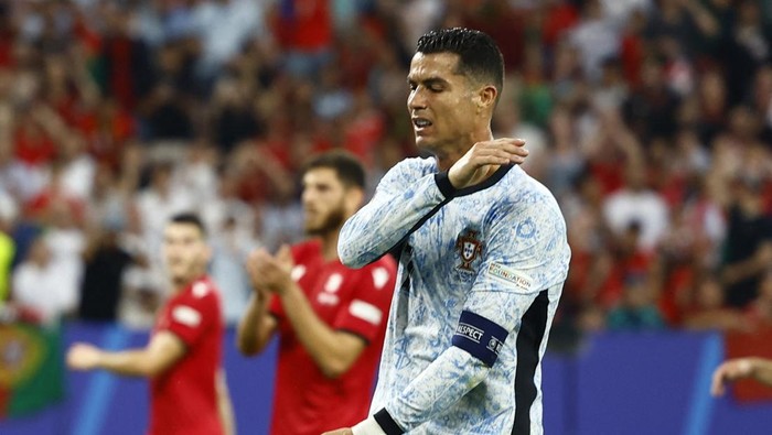 Soccer Football - Euro 2024 - Group F - Georgia v Portugal - Arena AufSchalke, Gelsenkirchen, Germany - June 26, 2024  Portugals Cristiano Ronaldo reacts after missing a chance to score REUTERS/Leon Kuegeler