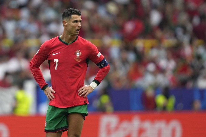 Cristiano Ronaldo Portugal's Cristiano Ronaldo reacts during a Group F match between Turkey and Portugal at the Euro 2024 soccer tournament in Dortmund, Germany, Saturday, June 22, 2024. (AP Photo/Darko Vojinovic)