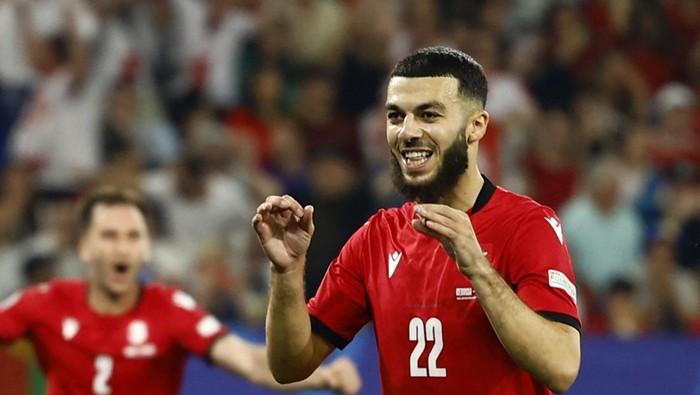 Soccer Football - Euro 2024 - Group F - Georgia v Portugal - Arena AufSchalke, Gelsenkirchen, Germany - June 26, 2024  Georgias Georges Mikautadze celebrates scoring their second goal REUTERS/Leon Kuegeler