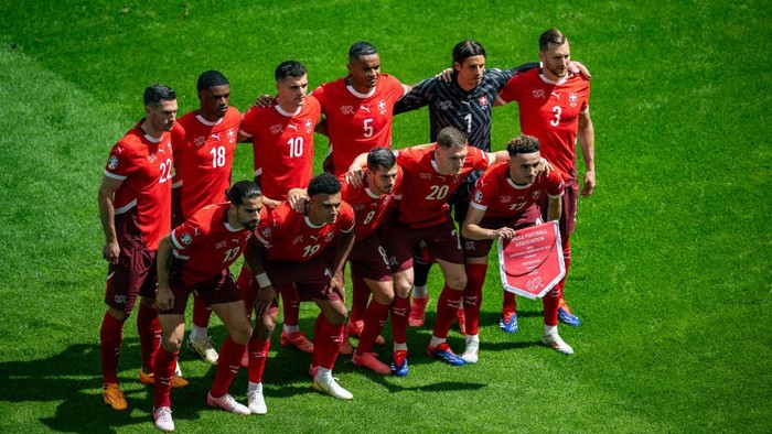 COLOGNE, GERMANY - JUNE 15:  Team Switzerland posing for a team photo before the UEFA EURO 2024 group stage match between Hungary and Switzerland at Cologne Stadium on June 15, 2024 in Cologne, Germany. (Photo by Kevin Voigt/GettyImages)