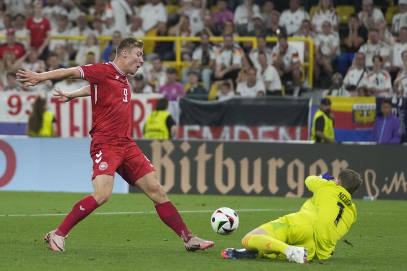 Denmark's Rasmus Hojlund is dejected after failing to score during a round of sixteen match between Germany and Denmark at the Euro 2024 soccer tournament in Dortmund, Germany, Saturday, June 29, 2024. (AP Photo/Andreea Alexandru)