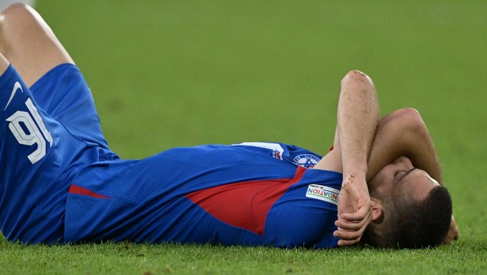 GELSENKIRCHEN, GERMANY - JUNE 30: David Hancko of Slovakia dejected after the UEFA EURO 2024 round of 16 match between England and Slovakia at Arena AufSchalke on June 30, 2024 in Gelsenkirchen, Germany. (Photo by Sebastian Frej/MB Media/Getty Images)