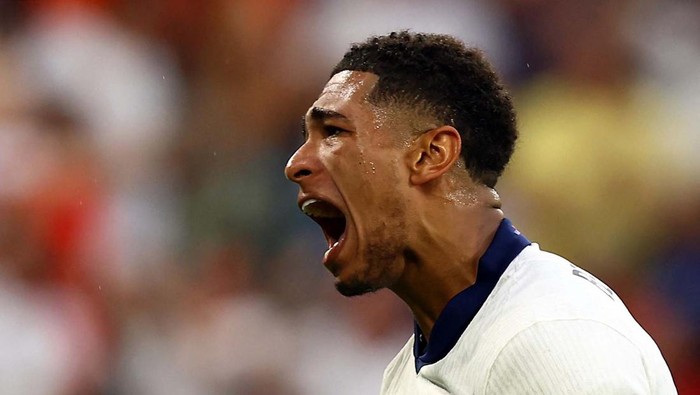 Soccer Football - Euro 2024 - Round of 16 - England v Slovakia - Arena AufSchalke, Gelsenkirchen, Germany - June 30, 2024
Englands Jude Bellingham celebrates after Harry Kane scores their second goal REUTERS/Lee Smith