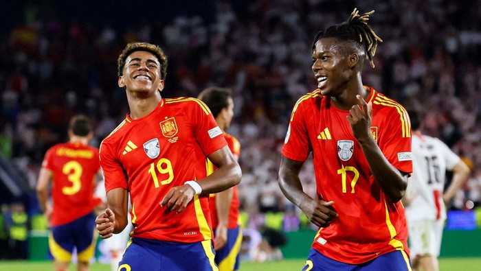 Soccer Football - Euro 2024 - Round of 16 - Spain v Georgia - Cologne Stadium, Cologne, Germany - June 30, 2024
Spains Nico Williams celebrates scoring their third goal with Lamine Yamal REUTERS/Wolfgang Rattay     TPX IMAGES OF THE DAY