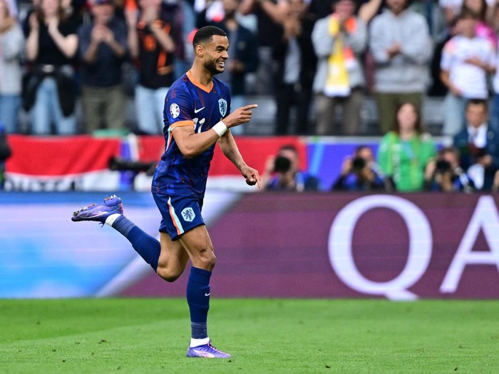 Soccer Football - Euro 2024 - Round of 16 - Romania v Netherlands - Munich Football Arena, Munich, Germany - July 2, 2024 Netherlands' Cody Gakpo celebrates scoring their first goal REUTERS/Angelika Warmuth