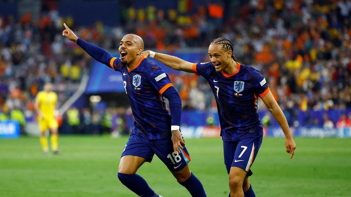 Donyell Malen pemain pertama yang mencetak brace di Euro 2024. (Foto: REUTERS/Angelika Warmuth)