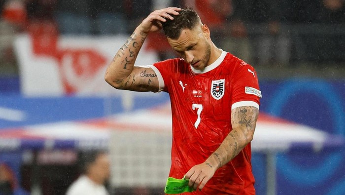 Soccer Football - Euro 2024 - Round of 16 - Austria v Turkey - Leipzig Stadium, Leipzig, Germany - July 2, 2024 Austrias Marko Arnautovic looks dejected after the match REUTERS/Wolfgang Rattay     TPX IMAGES OF THE DAY
