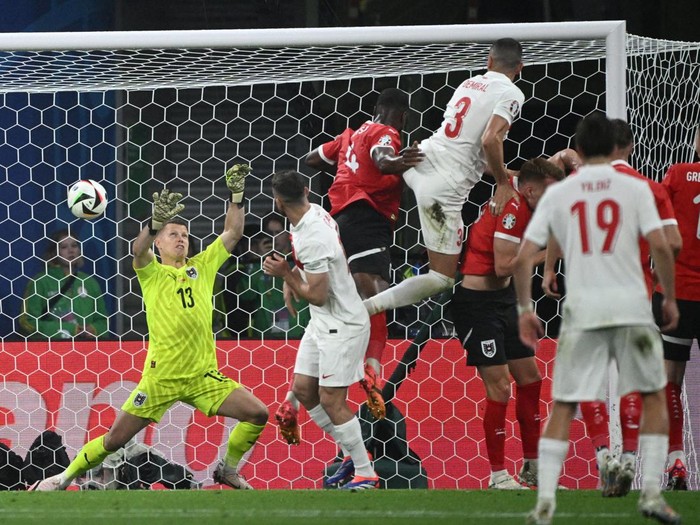 Soccer Football - Euro 2024 - Round of 16 - Austria v Turkey - Leipzig Stadium, Leipzig, Germany - July 2, 2024
Turkey's Mert Gunok, Merih Demiral and Abdulkerim Bardakci react REUTERS/Annegret Hilse     TPX IMAGES OF THE DAY