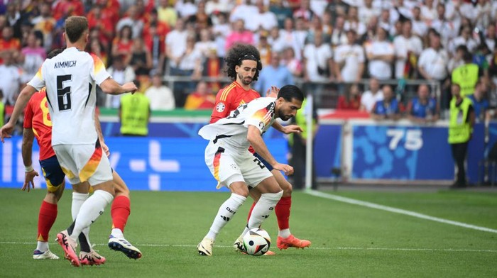STUTTGART, GERMANY - JULY 05: March Cucurella (24 rear) of Spain in action against Emre Can (25) of Germany during the UEFA EURO 2024 Quarter-Final match between Spain and Germany at Stuttgart Arena on July 05, 2024 in Stuttgart, Germany. (Photo by Gokhan Balci/Anadolu via Getty Images)
