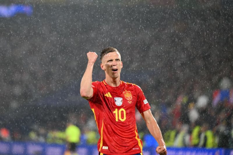 COLOGNE, GERMANY - JUNE 30: Dani Olmo (10) of Spain celebrates after scoring a goal during the UEFA EURO 2024 round of 16 match between Spain and Georgia at Cologne Stadium (RheinEnergieStadion) on June 30, 2024 in Cologne, Germany. (Photo by Gokhan Balci/Anadolu via Getty Images)