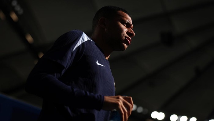 HAMBURG, GERMANY - JULY 04: Kylian Mbappe of France walks out of the tunnel during a France training session at Volksparkstadion on July 04, 2024 in Hamburg, Germany. (Photo by Alex Pantling - UEFA/UEFA via Getty Images)