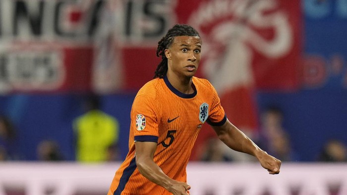 Nathan Ake of the Netherlands controls the ball during a Group D match between the Netherlands and France at the Euro 2024 soccer tournament in Leipzig, Germany, Friday, June 21, 2024. (AP Photo/Hassan Ammar)
