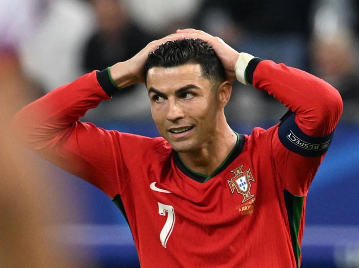 Soccer Football - Euro 2024 - Quarter Final - Portugal v France - Hamburg Volksparkstadion, Hamburg, Germany - July 5, 2024 Portugal's Cristiano Ronaldo reacts after missing a chance to score REUTERS/Carmen Jaspersen