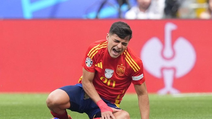 Spains Pedri looks in pain after an injury before leaving the game during the UEFA Euro 2024, quarter-final match at the Stuttgart Arena in Stuttgart, Germany. Picture date: Friday July 5, 2024. (Photo by Martin Rickett/PA Images via Getty Images)