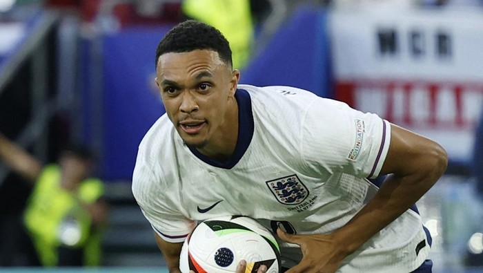 Soccer Football - Euro 2024 - Quarter Final - England v Switzerland - Dusseldorf Arena, Dusseldorf, Germany - July 6, 2024 Englands Trent Alexander-Arnold celebrates after winning the penalty shootout REUTERS/John Sibley