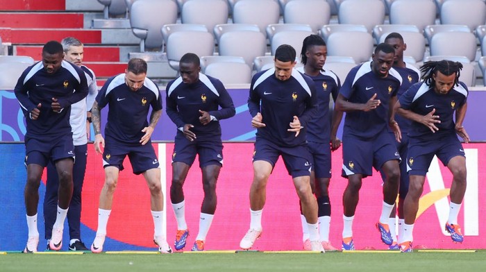MUNICH, GERMANY - JULY 08: Players exercise during a training session ahead of their UEFA EURO 2024 semi-final match against Spain at Munich Football Arena on July 08, 2024 in Munich, Germany. (Photo by Alex Grimm/Getty Images)