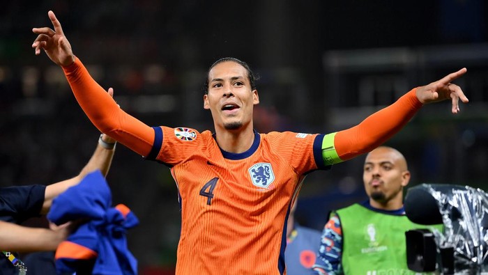 BERLIN, GERMANY - JULY 06: Virgil van Dijk of the Netherlands celebrates victory after the UEFA EURO 2024 quarter-final match between Netherlands and Türkiye at Olympiastadion on July 06, 2024 in Berlin, Germany. (Photo by Justin Setterfield/Getty Images)