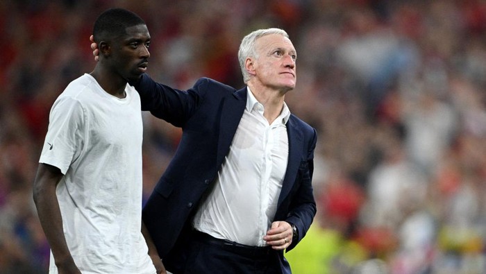 Soccer Football - Euro 2024 - Semi Final - Spain v France - Munich Football Arena, Munich, Germany - July 9, 2024  France coach Didier Deschamps and Ousmane Dembele look dejected after the match REUTERS/Annegret Hilse