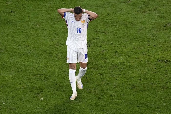 Kylian Mbappe of France reacts during a semifinal match between Spain and France at the Euro 2024 soccer tournament in Munich, Germany, Tuesday, July 9, 2024. (AP Photo/Ariel Schalit)