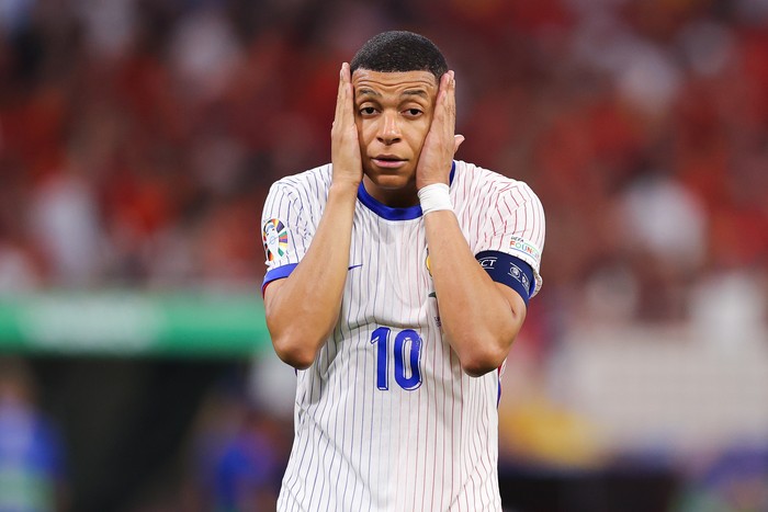 MUNICH, GERMANY - JULY 09: Kylian Mbappe of France looks dejected after the UEFA EURO 2024 semi-final match between Spain v France at Munich Football Arena on July 09, 2024 in Munich, Germany. (Photo by James Gill - Danehouse/Getty Images)