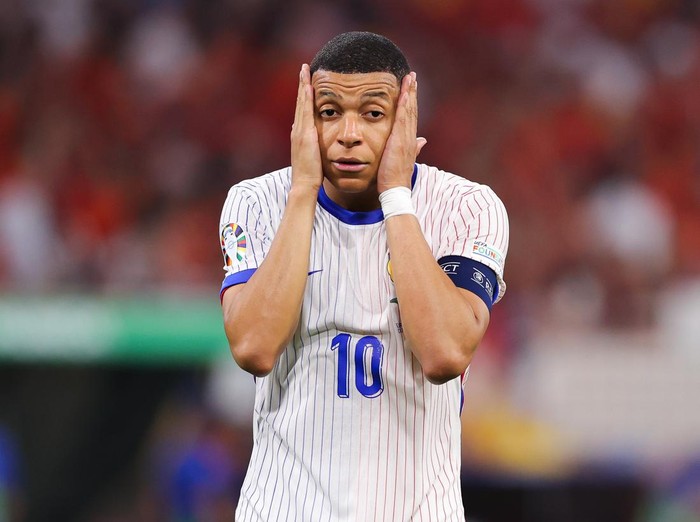MUNICH, GERMANY - JULY 09: Kylian Mbappe of France looks dejected after the UEFA EURO 2024 semi-final match between Spain v France at Munich Football Arena on July 09, 2024 in Munich, Germany. (Photo by James Gill - Danehouse/Getty Images)