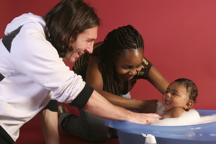 This photo taken in Sept. 2007 shows a 20-year-old Lionel Messi, who had embarked on his legendary Barcelona career just over four years prior, cradling Lamine Yamal, who was merely six months old at the time during a photo session in the dressing room of the Camp Nou stadium in Barcelona, Spain. Lamine Yamal is now a soccer sensation for both Spain and Barcelona and he is still only 16-years-old. (AP Photo/Joan Monfort)
