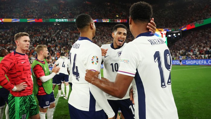 DORTMUND, GERMANY - JULY 10: Ezri Konsa, Jude Bellingham and Ollie Watkins of England celebrate after the teams victory in the UEFA EURO 2024 semi-final match between Netherlands and England at Football Stadium Dortmund on July 10, 2024 in Dortmund, Germany. (Photo by Eddie Keogh - The FA/The FA via Getty Images)