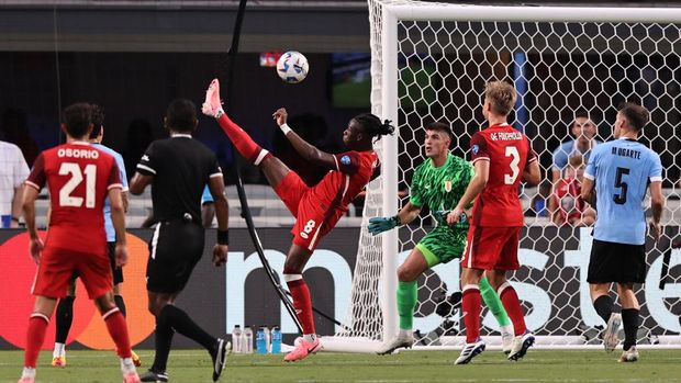 CHARLOTTE, NORTH CAROLINA - JULY 13: Ismael Kone of Canada scores the team's first goal during the CONMEBOL Copa America 2024 third place match between Uruguay and Canada at Bank of America Stadium on July 13, 2024 in Charlotte, North Carolina. (Photo by Omar Vega/Getty Images)