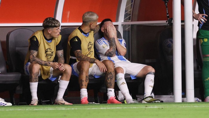 Soccer Football - Copa America 2024 - Final - Argentina v Colombia - Hard Rock Stadium, Miami, Florida, United States - July 14, 2024 Argentina's Lionel Messi reacts after sustaining an injury REUTERS/Agustin Marcarian     TPX IMAGES OF THE DAY