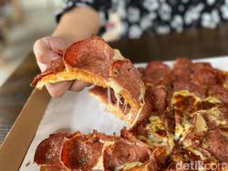 Makan Pizza Tersisa 1 Potong? Ini Saran Ahli Etiket untuk Menyantapnya