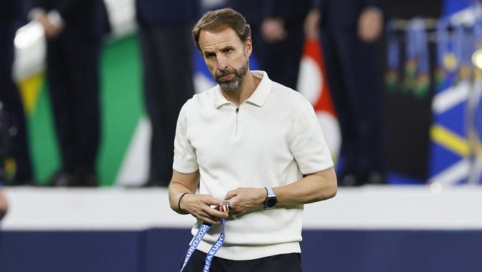 Gareth Southgate Soccer Football - Euro 2024 - Final - Spain v England - Berlin Olympiastadion, Berlin, Germany - July 14, 2024 England manager Gareth Southgate looks dejected after collecting his runners up medal REUTERS/Wolfgang Rattay