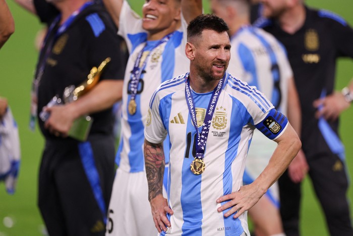 Jul 14, 2024; Miami, FL, USA; Argentina forward Lionel Messi (10) celebrates after winning the Copa America Final against Colombia at Hard Rock Stadium. Mandatory Credit: Nathan Ray Seebeck-USA TODAY Sports