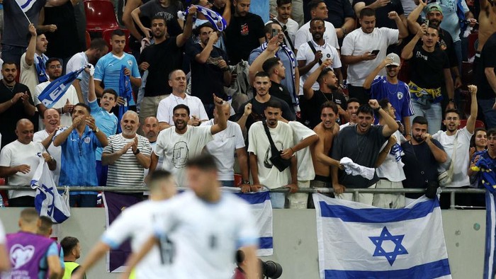 BUCHAREST, ROMANIA - SEPTEMBER 09: Fans of Israel show their support during the UEFA EURO 2024 European qualifier match between Romania and Israel at National Arena on September 09, 2023 in Bucharest, Romania. (Photo by Francesco Scaccianoce - UEFA/UEFA via Getty Images)