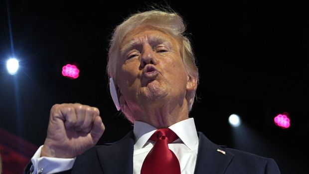 Former US President and 2024 Republican presidential candidate Donald Trump gestures after accepting his party's nomination at the end of the last day of the 2024 Republican National Convention at the Fiserv Forum in Milwaukee, Wisconsin, on July 18, 2024. Days after he survived an assassination attempt Trump won formal nomination as the Republican presidential candidate and picked Ohio US Senator J.D. Vance for running mate. (Photo by Nick Oxford / AFP)
