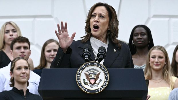 US Vice President Kamala Harris speaks during an event honoring National Collegiate Athletic Association (NCAA) championship teams from the 2023-2024 season, on the South Lawn of the White House in Washington, DC on July 22, 2024. Joe Biden on July 21, 2024 dropped out of the US presidential election and endorsed Vice President Kamala Harris as the Democratic Party's new nominee, in a stunning move that upends an already extraordinary 2024 race for the White House. Biden, 81, said he was acting in the 
