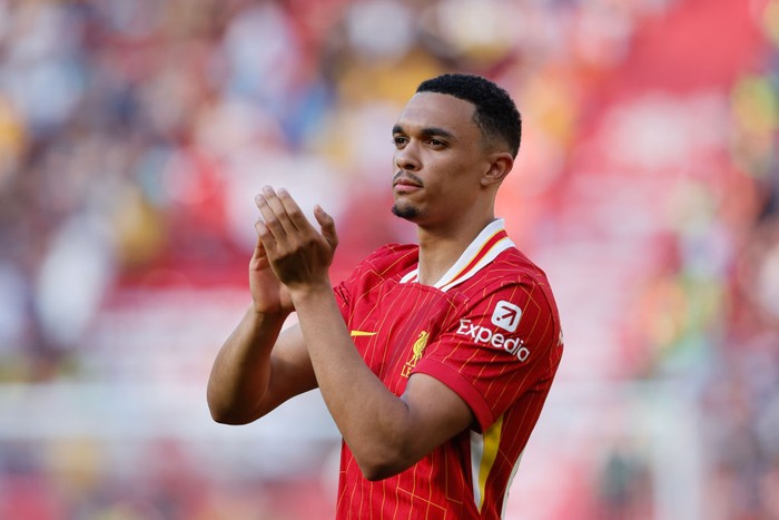 Trent Alexander-Arnold LIVERPOOL, ENGLAND - MAY 19: Trent Alexander-Arnold of Liverpool applauds at full time after the Premier League match between Liverpool FC and Wolverhampton Wanderers at Anfield on May 19, 2024 in Liverpool, England.(Photo by James Baylis - AMA/Getty Images)