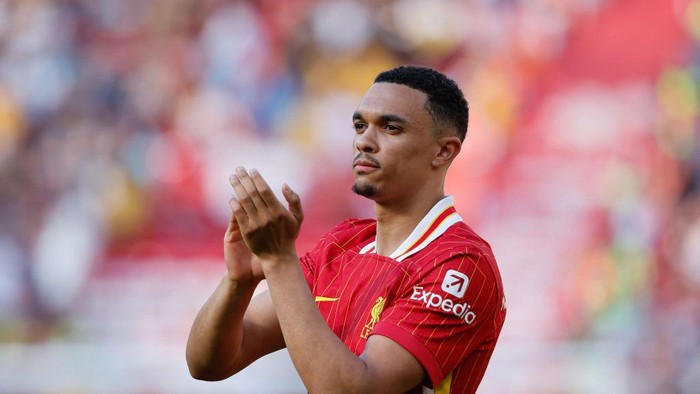 LIVERPOOL, ENGLAND - MAY 19: Trent Alexander-Arnold of Liverpool applauds at full time after the Premier League match between Liverpool FC and Wolverhampton Wanderers at Anfield on May 19, 2024 in Liverpool, England.(Photo by James Baylis - AMA/Getty Images)