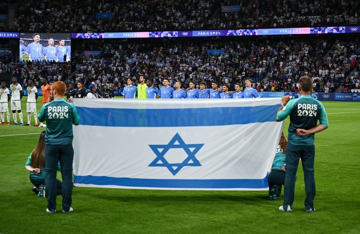 2162690949 Paris , France - 24 July 2024; The Israel team stand for the national anthem before the Men's Football Pool D match between Team Mali and Team Israel at the Parc des Princes during the 2024 Paris Summer Olympic Games in Paris, France. (Photo By Brendan Moran/Sportsfile via Getty Images)