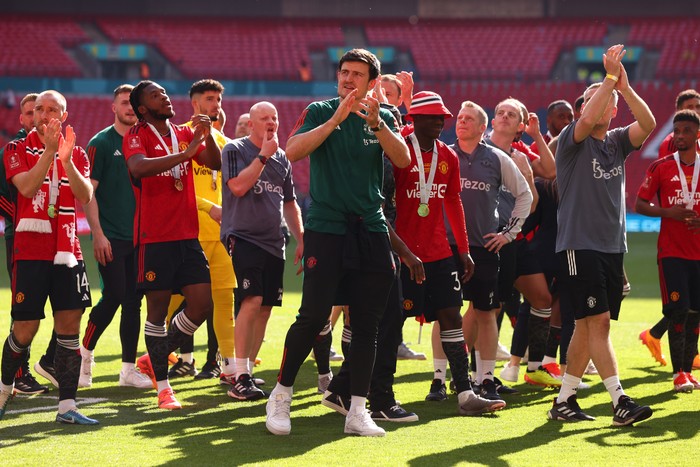 LONDON, ENGLAND - MAY 25: Harry Maguire of Manchester United applauds after  the Emirates FA Cup Final match between Manchester City and Manchester United at Wembley Stadium on May 25, 2024 in London, England.(Photo by Marc Atkins/Getty Images)