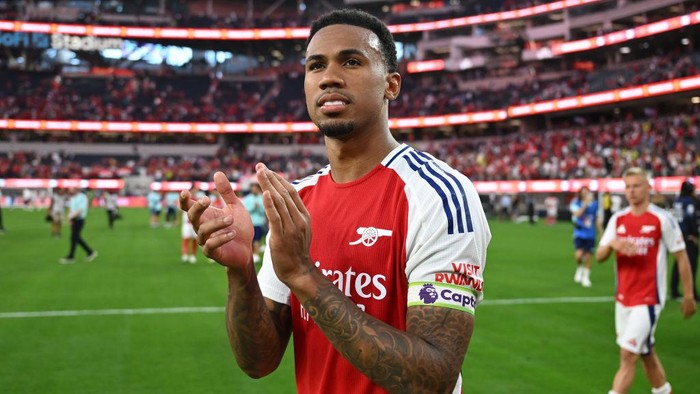 INGLEWOOD, CALIFORNIA - JULY 27: Gabriel Magalhaes of Arsenal FC acknowledges fans following the Pre-Season Friendly match between Arsenal FC and Manchester United at SoFi Stadium on July 27, 2024 in Inglewood, California.  (Photo by Stuart MacFarlane/Arsenal FC via Getty Images)