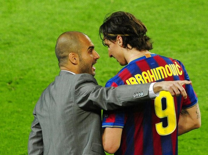 FC Barcelona's Zlatan Ibrahimovic of Sweden, right talks with his coach Pep Guardiola, during the Champions League semifinal second leg soccer match between FC Barcelona and Inter Milan at the Camp Nou stadium in Barcelona, Spain, Wednesday, April 28, 2010. Inter lost the match 0-1, but went through to the final 3-2 on aggregate. (AP Photo/Manu Fernandez)