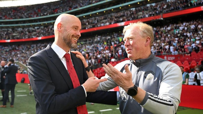 LONDON, ENGLAND - MAY 25: Erik ten Hag, Manager of Manchester United, interacts with Steve McClaren Assistant Coach of Manchester United during the Emirates FA Cup Final match between Manchester City and Manchester United at Wembley Stadium on May 25, 2024 in London, England. (Photo by Michael Regan - The FA/The FA via Getty Images)