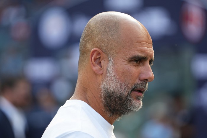 Jul 27, 2024; New York, NY, USA; Manchester City head coach Pep Guardiola looks before the match against AC Milan at Yankee Stadium. Mandatory Credit: Lucas Boland-USA TODAY Sports