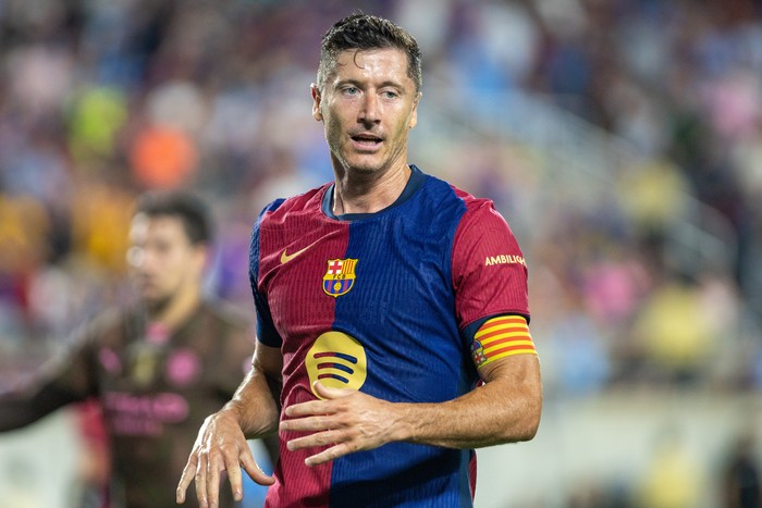 ORLANDO, FLORIDA - JULY 30: Robert Lewandowski #9 of FC Barcelona reacts to a missed shot during a match between Manchester City and FC Barcelona at Camping World Stadium on July 30, 2024 in Orlando, Florida. (Photo by Eston Parker/ISI Photos/Getty Images)