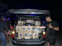 Polisi Sergap Mobil Kijang Penuh dengan Arak di Tol Jombang