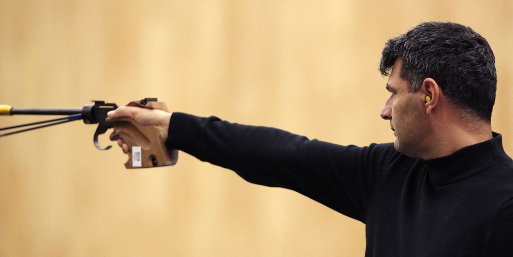 Turkey's Yusuf Dikec competes in the 50m pistol men event during the Baku 2017 4th Islamic Solidarity Games at the Baku Shooting Centre in Baku on May 15, 2017. (Photo by JOHANNA LEGUERRE / Baku 2017 / BAKU 2017 organization committee)