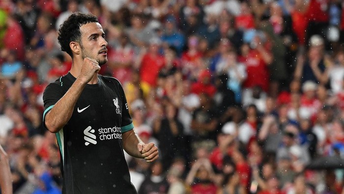 COLUMBIA, SOUTH CAROLINA - AUGUST 03: (THE SUN OUT, THE SUN ON SUNDAY OUT) Curtis Jones of Liverpool celebrates after scoring the second goal during the pre-season match between Manchester United and Liverpool at Williams-Brice Stadium on August 03, 2024 in Columbia, South Carolina. (Photo by John Powell/Liverpool FC via Getty Images)