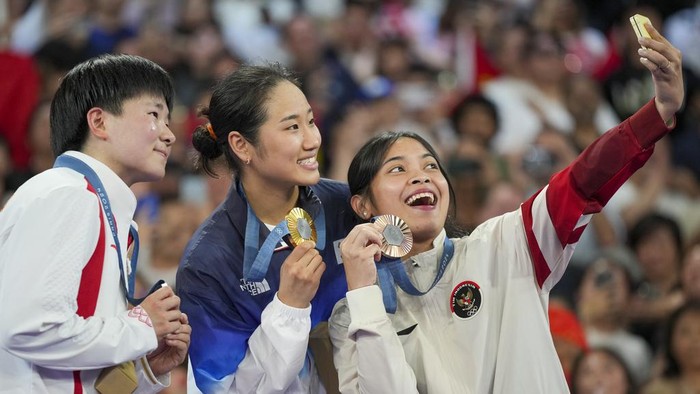 Bulutangkis mengulangi catatan buruk Olimpiade London di Paris, ini kata Christia Hadinata. (Foto: AP/Kin Cheung) Bulutangkis mengulangi catatan buruk Olimpiade London di Paris, ini kata Christia Hadinata. (Foto: AP/Kin Cheung)